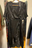 I ordered SEVERAL dresses from Lulus for a spring evening wedding, but none of them were "right" for the occasion. Some weren't the right size, others were too heavy, but this dress made me happy, and my boyfriend loved how flattering it was. The shiny, quality material felt dressy enough without weighing me down; the flowy sleeves flattered my arms, which I'm self conscious of; the dress cinched the smallest part of my waist and flowed outward, flattering the belly pouch I'm also self conscious of; and the cut made my chest look tasteful without being too much. Overall, very happy, once again, with my Lulus purchase. 

*And the return process is forever easy breezy with Lulus for the dresses that didn't make the cut. - Amanda B.