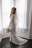 This is a beautiful, quality dress. Fits true to size and is very comfortable. I wore this for my wedding and received so many compliments! - Taylor R.