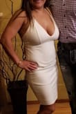 I love this dress I feel sexy in it, the material is stretchy - Isela V.