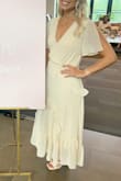 I wore this to my bridal shower and it was perfect. I should have ordered an XS but ordered a S. It was big, as to be expected, but still fit nicely! - Rhiannon B.