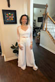 Instead of going the pajama route, I used this as my getting-ready outfit for my wedding day, I felt beautiful in it. The pants flow beautifully and it looks very elegant. It was a little tighter fitting around the waist, but I would still have chosen my regular size, a medium. Can't wait to wear it again! - Katherine M.