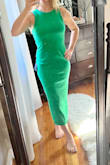 Gorgeous dress. Nice thick material, though it does run small- I always size up for Lulus bodycon dresses. 
With that being said, the green color looks different from the photos online. It's more of a Kelly green, though I was expecting more of a neon green. Very nice dress, but I'll be returning it due to the color. - Stephanie S.
