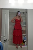 It looks great but it literally will not zip whether it is on me or not, it keeps getting hung up in one spot and it's very disappointing because of how good it looks on and the wedding is this weekend. - Kaci K.