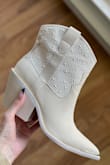 I was so excited to get these to finish my Nashville looks. Leather is really soft and beading is pretty. I'm so impressed with the quality. Overall comfortable for all the nights out.
Usually I'm a 10/41 in most brands but this one was definitely on the larger size. I'll make do with an insole but I would have preferred a full size down in a 9. I also have very narrow ankles so it's quite loose around me, very wearable! - Ainsleigh D.