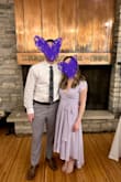 I bought this dress for my sister-in-law's wedding, who kindly requested the family all wear some shade of purple. I loved the color of this dress and the fit was flattering. I do wish it had a button or some sort of closure device in the bust area as it showed a little too much cleavage for a family event and I ended up having to safety pin it. Overall great dress though! - Cate N.