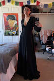 it was quite long which isn't a surprise considering my height. the fit was so perfect and I brought it to a seamstress to take some of the lengths off. I was going to buy a size small but after taking the size quiz for this dress I decided to go with an xs which I'm very happy with. this dress is so divine and beautiful, I'm very excited to wear it to my senior ball:) simple and elegant! - Sophia C.