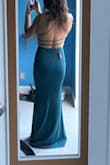 I needed a teal dress to wear as my maid of honor dress and this color was perfect. I wasn't sure if I should go with XS or S. S was out of stock so I went with XS and while it it tight, I think it's partly the style of the dress to be form-fitting. It's still wearable and I love that it gives me a nice shape. The fabric is thick and not slippery. I need to get it hemmed (that's a given since I'm short) and haven't worn it for the big day yet so I can't speak for how it is to wear it for hours, but I loved it trying it on and decided to keep it. - Marina V.