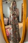 I bought this dress for a wedding and can't wait to wear it! The design and material are so beautiful and elegant. I am very petite at 4'11 so I ended up having it altered: hemmed and the straps taken in a little. But now it's perfect! - Kayla F.