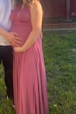 After looking at hundreds of dresses for my baby shower I finally found this one, and it was absolutely perfect! It was extremely comfortable, and I love how you can customize the top to wear however you want. I am usually a size medium so I decided to stick with the same size, and it worked great because the material was very stretchy. The color was exactly as expected and felt high quality. Definitely recommend this dress and can't wait to wear it again! - Skylah C.