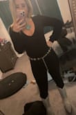 I LOVE this bodysuit. It's stretchy, but still very much fitted. Pairs really well with pretty much any bottom I've tried. - Ellen E.