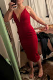 Better to order a size smaller if you get this dress. The material is stretchy enough that you'd want it to be a tighter fit. Unless you have a big bust, then maybe not. - Jessica M.