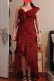 I don't know if this is because I possibly received someone else's returned dress that potentially got stretched out? but the fit of this dress was very strange. The photo is with the left strap tightened completely. The whole top was extremely loose despite ordering a M (my normal size). The strap is giant and the left stitching for the breast (supposed to be in the center) is almost in my armpit. The rest of the dress fits nicely so I don't know what happened. It's like the top is a large and the rest is a M. I am not small-chested (34DD) and I have broad shoulders so I was shocked. I am getting this tailored because I love the color and style; however, the tailoring costs as much as the dress! This is my first purchase from Lulus so I do not know if this is normal for this site. - Kelly F.