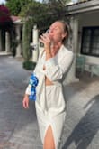 Absolutely love this dress! Got so many compliments on it. Wore it on a trip celebrating my engagement. Perfect for bridal events. I am between a medium and large, happy I went with the large to get a little extra room across the back and hips - Kelsey H.