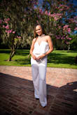 I love jumpsuits. I had a photoshoot with my best friends and we had to wear white. This was the perfect outfit! I received so many compliments from my friends. I bought a size medium and the fit was just right. - Kimberly G.