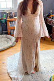 I had a wedding dress that I paid a lot more for and regretted after purchasing. I bought this in hopes that I would be able to save money and find something I liked better and it's perfect! It fits me perfectly in the body - the cup size needs to be brought in a bit but it's otherwise perfect! Great quality, beautiful train, thick material but still comfortable! Im so excited to wear this for my October wedding! I wish I had just found this first! - Catherine C.