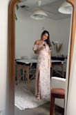 Purchased for a floral themed bridal shower and got so many compliments! It made me look extra slim, the off the shoulder sleeves hid my thick arms and the slit was a perfect touch. - Leisa E.