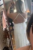 This dress was one I was considering for my wedding. Customer service did their best to try to communicate to the manufacturer about a defect. The straps were sewn into the side hems of the dress, and not on either side of the zipper in back, as pictured. It made the straps dig in and be uncomfortable. 4 dresses were sent to me. After receiving the first defective one, it was indicated a quality check would occur to ensure the straps were sewn correctly. The 3 I received thereafter all had the same issue. Customer service was very understanding and issued me a refund, in the end. Such a disappointment though, especially since it wasted a lot of valuable time having to ship and return the first few defective dresses. - Kimmy O.