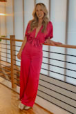 This two-piece outfit is absolutely gorgeous!! I was very surprised to find that the ties are on the pants! At first I thought this was weird, but then I realized it is genius because it holds the top in place so that it does not move around. This was fantastic considering you can't wear a bra with this outfit. The material and color are also stunning. Cannot recommend this outfit enough! Show stopper for sure. - Lindsey L.