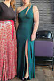 I had to get a gown to wear to a gala, and this dress was perfect! The slit was a little higher than I would normally prefer, and the side strap also came down low enough I couldn't wear my strapless, but I still loved it! Fit perfectly and I got lots of compliments! - Amber C.