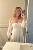 I was hesitant about it when I first put it on because of my dislike of my arms but my fiancé loved it and I do too. It fits the vibe I was going for for my wedding shower. Glad a took a chance on this dress. - MiKayla S.