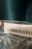 I ordered this dress in emerald green, and the dress that was sent is hunter green. In looking at other reviews, I realize that everyone is wearing a hunter green dress and the advertised emerald green dress is actually not what's being sold. When I looked at my receipt, it did say emerald green, but when I looked at the bag that the dress came in, it is in fact hunter green. The dress apparently doesnt come in emerald green at all. If you need that color specifically then buyer beware. I am still waiting on someone from Lulus to respond with a solution. - Tracy M.