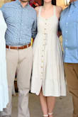 I liked the dress a lot but it's not as white as it looks in pictures, it's more beige. It still worked well for my wedding shower. I also had to use dress tape to keep the spaces between the buttons lined up on the top. - Lily H.
