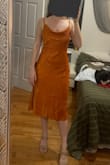 It's cute! The color is great and the material is really pretty and comfortable to wear. There's a lot of fabric up top with the cowl neck so I think I'll have to tuck and steam it in a particular way before wearing to an event but for the sale price, I got this at, definitely worth it. - Brianna S.