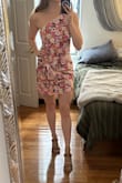 I'm a big fan of this dress. Beautiful pattern and flattering silhouette. It's a little bit big up top and under my arms but I wouldn't size down for fear of it being too tight in that area. - Brianna S.