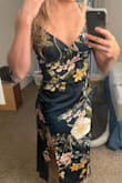 The dress is beautiful! However, I do not "love" it which is why it's getting 4 stars not 5. I'm going back and forth whether I want to return it or not. I am pretty flat chested and I plan on wearing a strapless bra w the dress. My bra shows even having the straps as tight as I can stand. The v part is a little off. Other than that it fits on my athletic built frame. Hugs all the curves! - Kristian C.