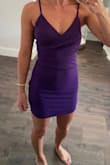 I originally ordered this dress in an xs and found it was a little tighter around the middle than I wanted. The picture I took is in the xs. To be honest, I didn't find that the small was much bigger. I love the color on this dress. In the end I didn't end up keeping it because I ordered a bunch of other cocktail dresses to try and although this fit great, I loved the different cuts of the other dresses. - Caroline M.