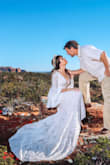 I got married in it on a super cold day in Sedona so I added warm tights and cowboy boots to it. Popped a flower crown on from Etsy and it looked like a million bucks. The quality is stunning and the length is perfection for tall girls like myself. Fits like a glove. Buy some breast tape on Amazon to get your cleavage to sit right. But this dress is gorgeous. - Dana B.