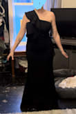 Very fitted, i need great shapewear. Comfortable and flattering. The ruffles aren't too much. Love it! - Katlyn K.