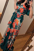 I ultimately returned this dress because the colors were a bit bold for the event I was shopping for, but I must say it was so beautiful and fit very well. - Ashley G.