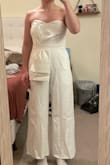 I ordered 4 different jumpsuits for graduation and this one ended up being the winner! Came in a little wrinkly but nothing an iron won't fix. I love the fabric and its the perfect length for me (I am 5'4 and it hits right at my ankles). Definitely recommend! - Carrie L.