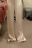 I'm so glad I looked at the reviews before I bought this!! It is extremely elegant and my boyfriend kept telling me how sexy I look in it! You will for sure get tons of compliments! Just beware that it is very long. I am 5'4 and had to get about 4in hemmed off of the bottom. - Carrie L.