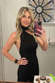 Fell in love with this dress the first time I saw it on the website. I wore it to a formal wedding and received lots of compliments. The material is thick and feels high quality for the price point. I absolutely love the overall design and silhouette - it's extremely flattering. It feels classy but the open back and slit take it up a notch. I am 5'3" so the slit didn't feel too high, but I did have the length altered. My one and only complaint about this dress is the sides near the bra line area felt a little loose even with size xs, so I did have that taken in slightly. I didn't want to be worried about gaping all night but wish there wasn't a need to make alterations other than the length. If you're considering, I highly recommend this dress! - Elizabeth C.