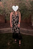 This dress is very elegant and flattering. I purchased it to wear for a spring wedding and it fit perfectly. The material is thick and smooth. To pull Zipper can be a little tricky but not impossible. Rate 10/10/ - Araylid S.