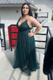 The dress fit perfectly, only thing I have to change is the hemming. The dress is definitely for a taller person, if there was a petite option that would have been great. Otherwise absolutely gorgeous, I purchased the dress for a wedding and I got soooo many compliments! Highly recommend! - Stephanie C.