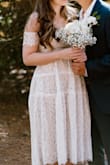 I wore the dress to the court wedding and also wore the dress to a photo shoot. the bust has no support, but it's ok for me. the fabric on the arms is uncomfortable and takes away movement from the arms. but I have in mind that this is not a time that I need an ultra comfortable dress, so I am very happy with the dress. - Lo S.