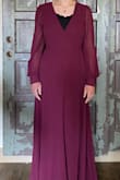 Very elegant and such a pretty color. I bought the plum. Very long, I bought a medium and I'm 5'8 and it went well below my feet. I got it hemmed and it wasn't a problem. The cuffs were also a little loose, but I prefer that to not being able to extend my arms without tugging at them! - Thea F.