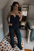 I normally wear a size small but got a medium in this and it fit perfect. It does have some stretch! - Kiana J.