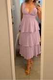 Adore the color. A bit tight to get fully zipped, but the large would be too loose. I got it for a wedding and I can't wait to wear it! - Mikayla S.