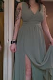 Pretty color! Loved the dress overall but decided to go with another one for a wedding. This was a little bit long with a 3" heel, it was still on the floor so would require a tailor if you are on the shorter side. - Gail S.