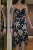 Very cute and comfortable. Would be great for a summer wedding or date night. Runs a little tight on my chest - Gail S.