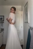 I ordered this dress to use as my wedding dress! I measured myself and ordered an extra small and it fits flawlessly. I love how elegant it looks while also not being over the top! I am so excited to wear it on my wedding day this weekend! - Emily M.