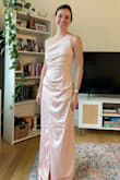 I feel comfortable and confident in the dress. Its classic, but the one shoulder makes it a little less basic. It's the perfect length to not drag on the floor with heels but still look full length. I'm a little nervous about the width of the slit when sitting down, but you can adjust the dress to avoid any issues - Elizabeth K.