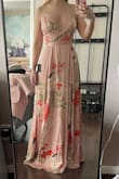 Such a pretty print, but it does look lighter in person. I wish it was slightly more bubblegum pink like the photos.
Size way down! The size calculator told me to get a small, I ordered an XXS and it is still a little big. It's also way too long, I'll have to get it hemmed.
I am bottom heavy with a smaller waist and this dress is really flattering! - Kelly D.