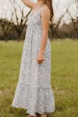 This dress fits perfectly. The details are beautiful and the material is so light and comfy. - Crystal K.