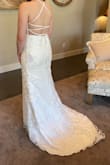 I chose to order a wedding dress online to save on the cost of it and was so pleasantly surprised! The details with the pearls and flowers are gorgeous. This dress made me feel so beautiful and I'm incredibly happy with it! It was a little tight to get over my butt but fits perfectly. My favorite part of the dress is the top part with the low dip. It is the perfect amount of sexy. Another plus is that a bra is not needed, it comes with a good amount of padding. The back is complicated to do so make sure to have someone help you! I highly recommend saving your money and ordering from Lulus! - Hallie E.