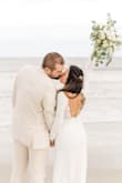 I chose this as my wedding dress and it was the best I could have asked for! I did get the bottom and sleeves hemmed as they were slightly long but it fit like a glove! Truly felt so beautiful on my special day! - Alanna U.
